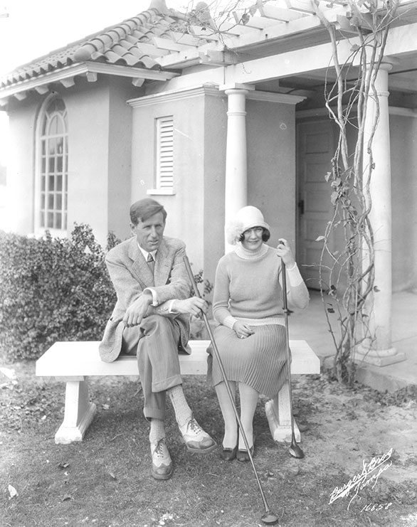 guests seated outside clubhouse