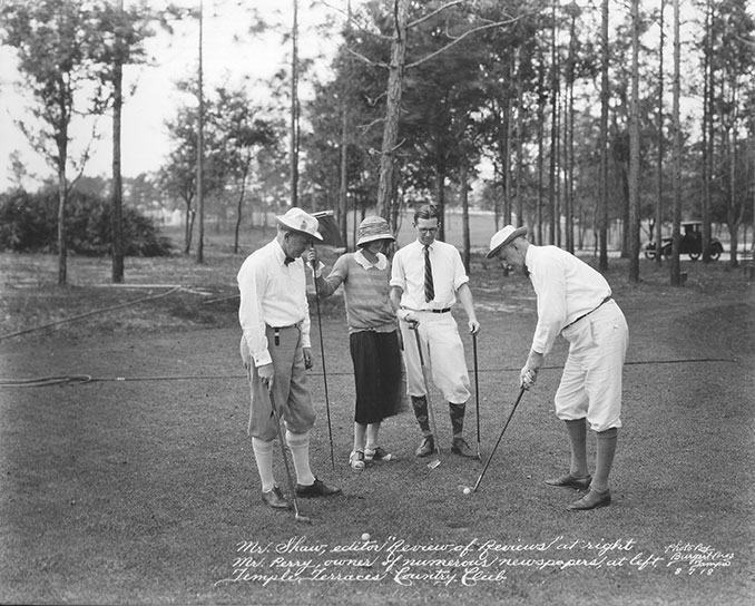 golfers on golf course 