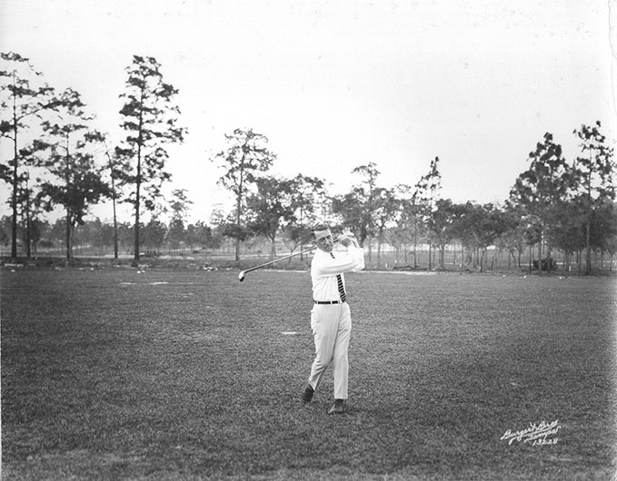 golfer taking a swing